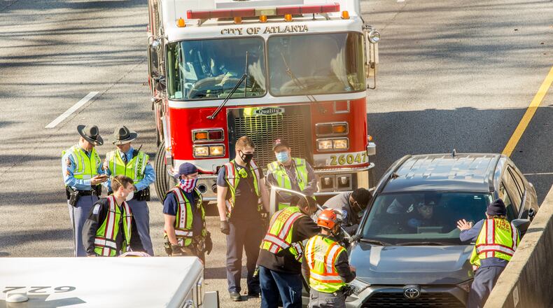 During an accident in January all lanes eastbound on I-20 at Lee Street were blocked as City of Atlanta Fire and EMS worked to get the driver out of the car. A study by the Insurance Institute for Highway Safety found that while men are involved in more fatal crashes, on a per crash basis women are 20-28% more likely than men to be killed and 37-73% more likely to be seriously injured. These statistics hold even after adjusting for speed and other factors. (Jenni Girtman for The Atlanta Journal-Constitution)
