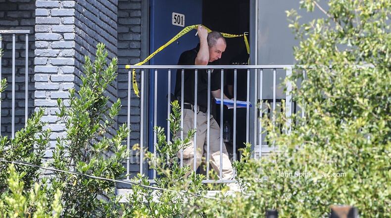 The man was shot at least once at a Motel 6 on Delk Road near I-75 in Marietta.