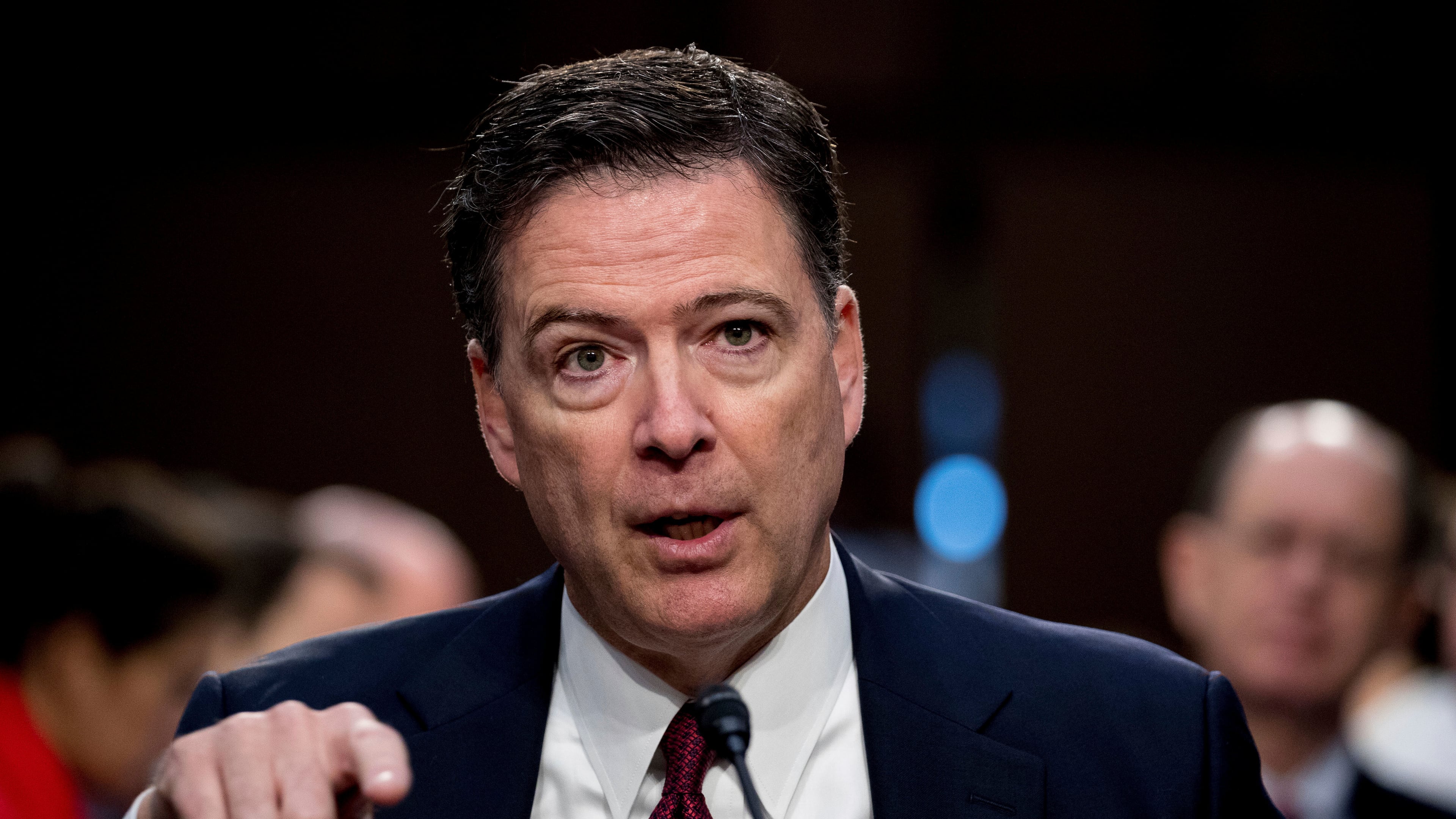 FILE - Former FBI director James Comey speaks during a Senate Intelligence Committee hearing on Capitol Hill, in Washington, June 8, 2017. (AP Photo/Andrew Harnik, File)