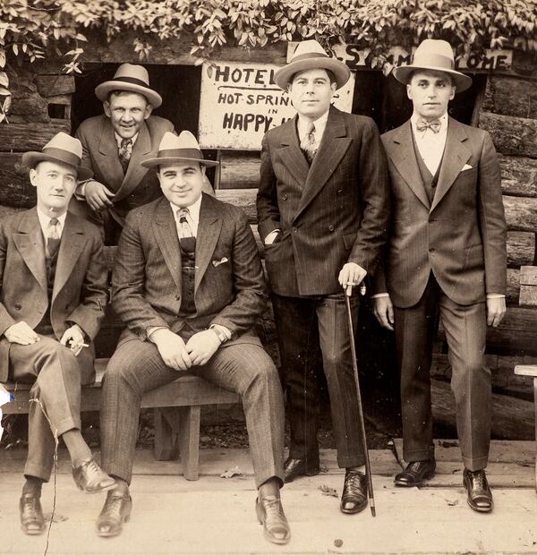 A vintage silver print photo shows Al Capone with associates at Hot Springs, Arkansas, in an undated photo. (Witherell's/Chicago Tribune/TNS)