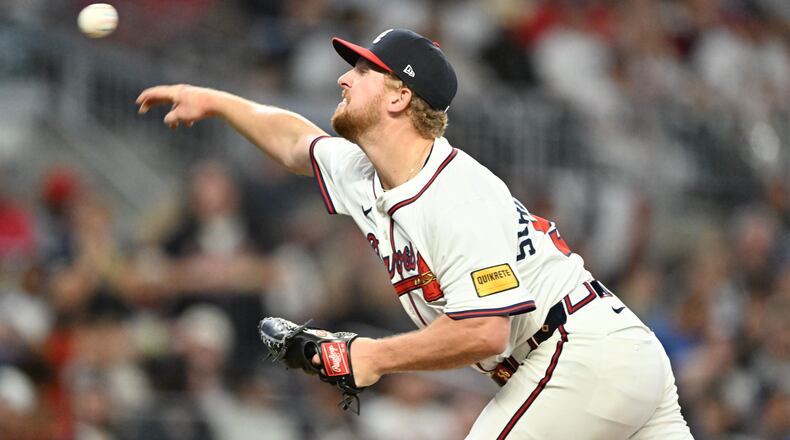 Atlanta Braves pitcher Spencer Schwellenbach (56) throws a pitch during the eighth inning of home opener baseball game at Truist Park, Friday, April 4, 2025, in Atlanta. Atlanta Braves won 10-0 over Miami Marlins. (Hyosub Shin / AJC)