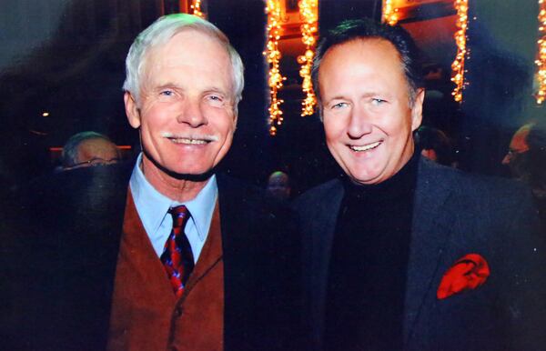 Bill Tush with Ted Turner at the 2009 Captain Planet Christmas Party. (Curtis Compton/AJC)