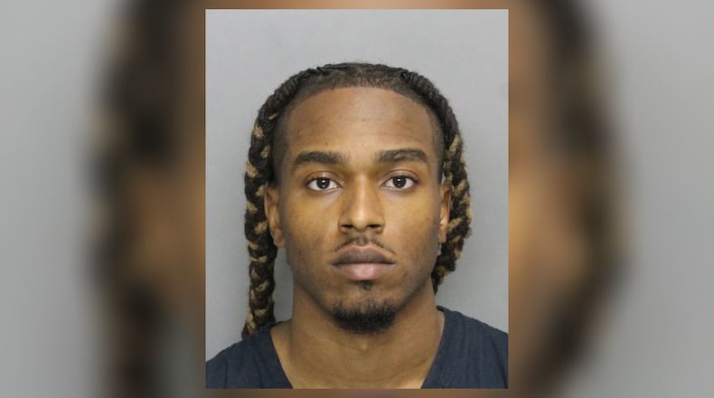 Bryan Anthony Rhoden was arrested Thursday in connection with the mysterious killings at an upscale Kennesaw golf course over Independence Day weekend.