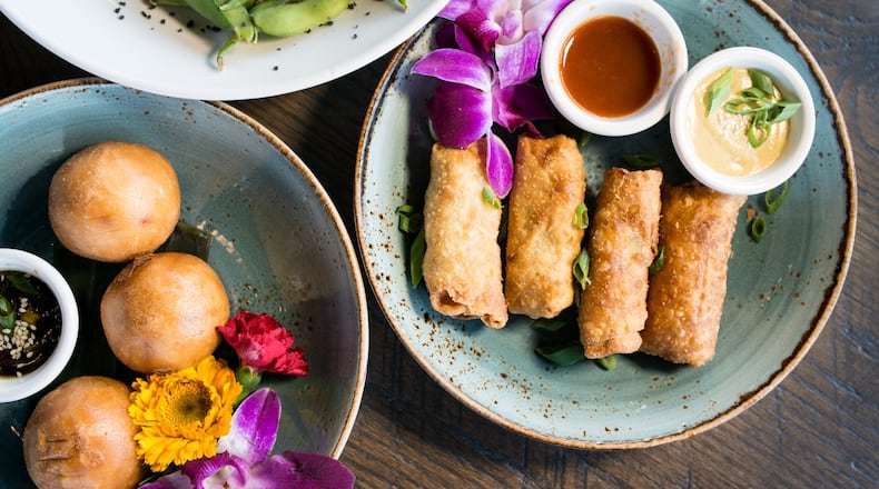 One Rooster Mongolian Bar appetizers include edamame with black lava sea salt, egg rolls, and crispy char siu park bao. Photo credit- Mia Yakel