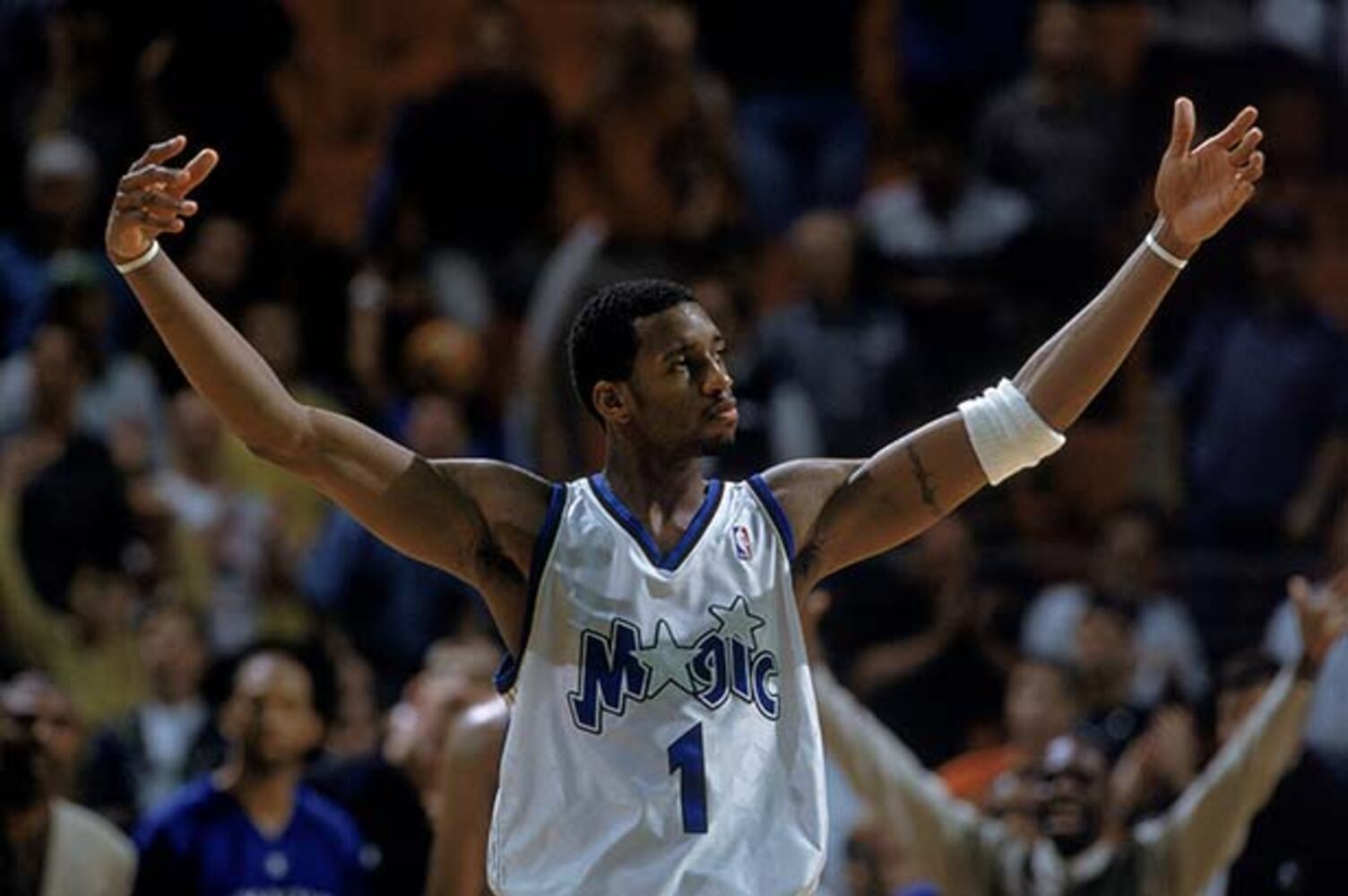 PHOTOS: Tracy McGrady retires from NBA at age 34