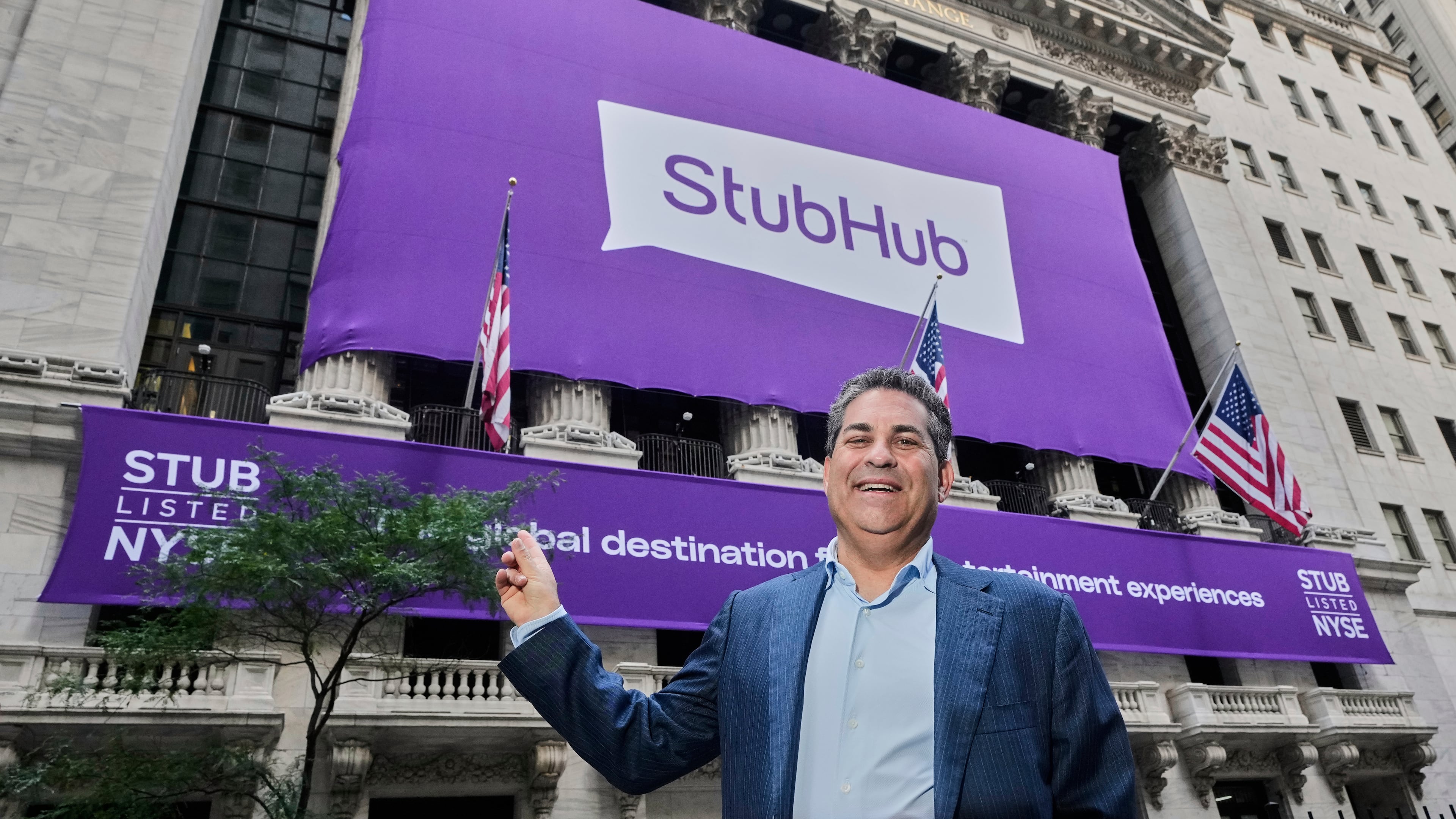 StubHub CEO Eric Baker poses for photos outside the New York Stock Exchange before his company's IPO, Wednesday, Sept. 17, 2025. (AP Photo/Richard Drew)