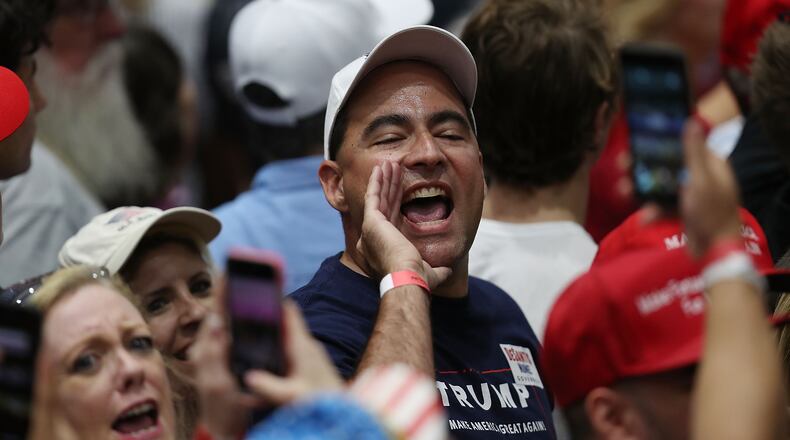 People yell at the news media as President Donald Trump talks about the press during a Wednesday campaign in Estero, Florida. President Trump continues travelling across America to help get the vote out for Republican candidates running for office. Joe Raedle/Getty Images