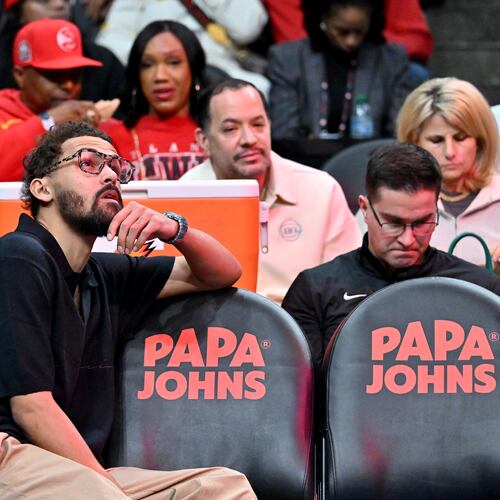 Trae Young sat on the bench during Wednesday's game, and in the fourth quarter, the team agreed to trade the four-time All-Star to the Wizards.