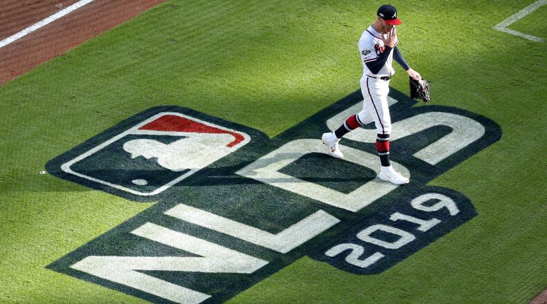 Braves starting pitcher Mike Foltynewicz exits Game 5 of the NLDS against the St. Louis Cardinals Wednesday, Oct. 9, 2019, at SunTrust Park in Atlanta.