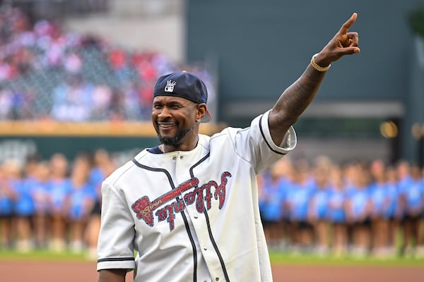 R&B artist Usher threw Wednesday's ceremonial first pitch at Truist Park.