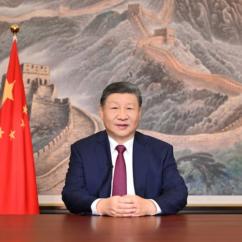 In this photo released by Xinhua News Agency, Chinese President Xi Jinping delivers his 2026 New Year message in Beijing on Wednesday, Dec. 31, 2025. (Yan Yan/Xinhua via AP)