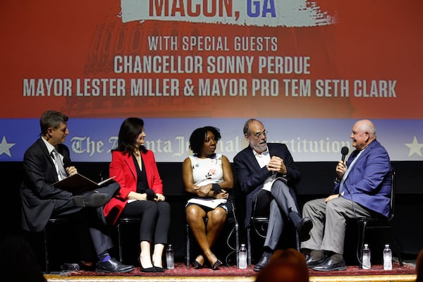 The AJC Politically GA team interview Sonny Perdue, then chancellor of the University System of Georgia (far right), during a live taping of the Politically Georgia podcast on May 16, 2024. (Natrice Miller/AJC)