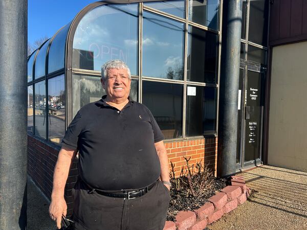 Manuel Magana, co-owner of El Torero Mexican Restaurant in Chamblee, stands in front of the eatery on Dec. 21, its final day of service. Managa and wife Carol opened the restaurant in 1981. (Olivia Wakim/AJC)