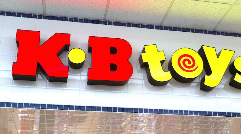 FILE PHOTO: KB Toys signage is visible atop the entranced to its store January 30, 2004 in Norridge, Illinois.