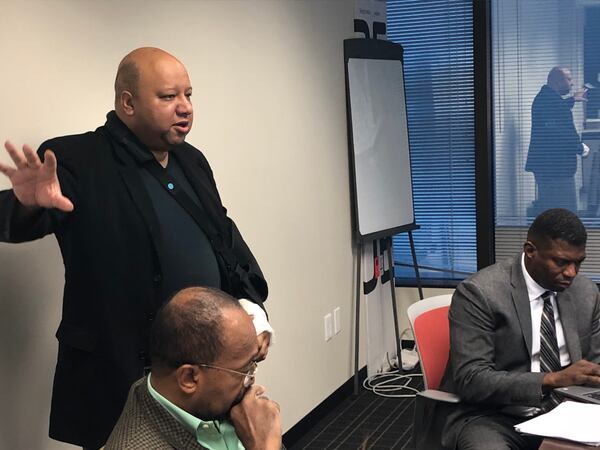 George Chidi, with Central Atlanta Progress, makes the case for using Fanplex for homeless services to members of the Atlanta-Fulton County Recreation Authority. SCOTT TRUBEY/STRUBEY@AJC.COM