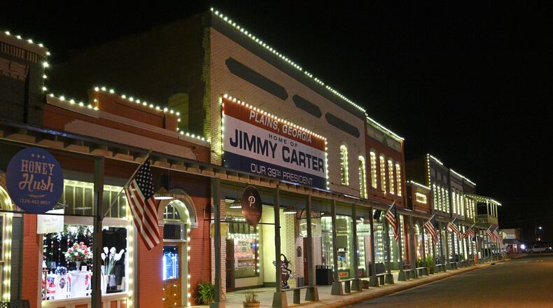 Downtown Plains is all lit up for President Carter and for the family, Tuesday, Feb. 21, 2023, in Plains, GA. (Hyosub Shin / Hyosub.Shin@ajc.com)