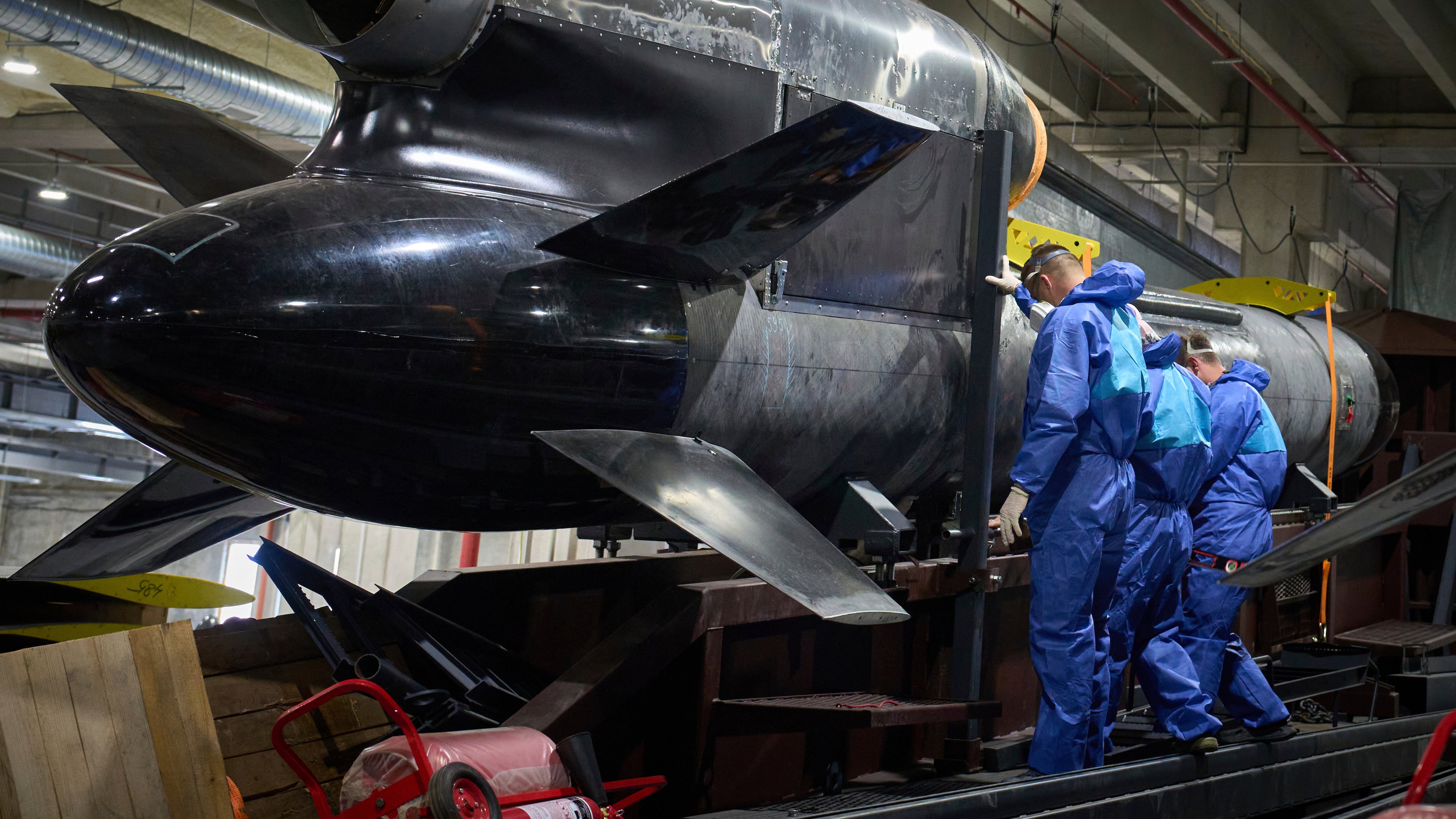FILE - Workers inspect a Flamingo cruise missile at Fire Point's secret factory in Ukraine on Monday, Aug. 18, 2025. (AP Photo/Efrem Lukatsky, File)