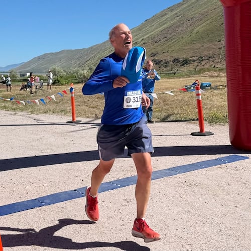 Former Atlanta Journal-Constitution sports writer Mike Knobler completes the Bear Lake Marathon in Idaho on June 5, 2026. It made him a finisher of a marathon in all 50 states and was also the first of his goal to run 26 marathons in 26 countries in 26 weeks. (Courtesy of Tyler Cleveland)