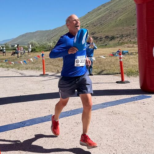 Former Atlanta Journal-Constitution sports writer Mike Knobler completes the Bear Lake Marathon in Idaho on June 5, 2026. It made him a finisher of a marathon in all 50 states and was also the first of his goal to run 26 marathons in 26 countries in 26 weeks. (Courtesy of Tyler Cleveland)