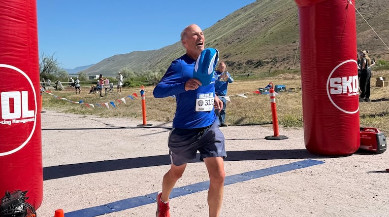 Former Atlanta Journal-Constitution sports writer Mike Knobler completes the Bear Lake Marathon in Idaho on June 5, 2026. It made him a finisher of a marathon in all 50 states and was also the first of his goal to run 26 marathons in 26 countries in 26 weeks. (Courtesy of Tyler Cleveland)