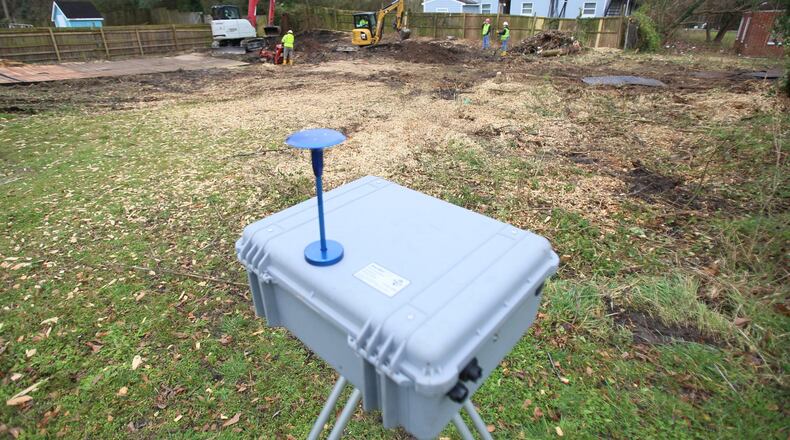A monitor set on site to supervise the toxic levels on the ground where The Environmental Protection Agency has been moving dirt at properties in the ‘lead zone’ on Atlanta’s westside on Jan. 27, 2020, in Atlanta.