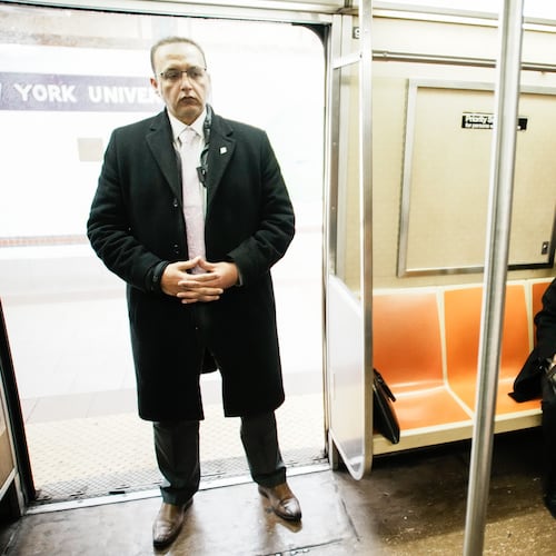 New York City Mayor Zohran Mamdani checks his agenda on the subway on his way to City Hall in New York, Friday, Jan. 2, 2026. (AP Photo/Eduardo Munoz Alvarez)