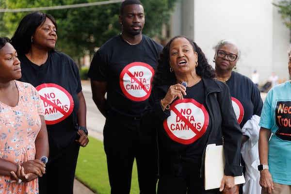 Gina Mangham speaks in opposition to the development of data centers in DeKalb County during a news conference before Tuesday's Board of Commissioners meeting. (Estela Muñoz/AJC)