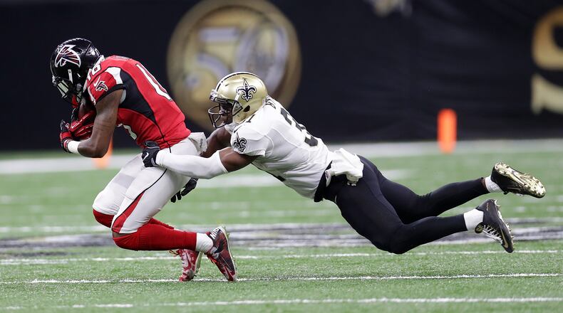 NEW ORLEANS, LA - SEPTEMBER 26: Taylor Gabriel #18 of the Atlanta Falcons is tackled by Jairus Byrd #31 of the New Orleans Saints at the Mercedes-Benz Superdome on September 26, 2016 in New Orleans, Louisiana. (Photo by Chris Graythen/Getty Images)