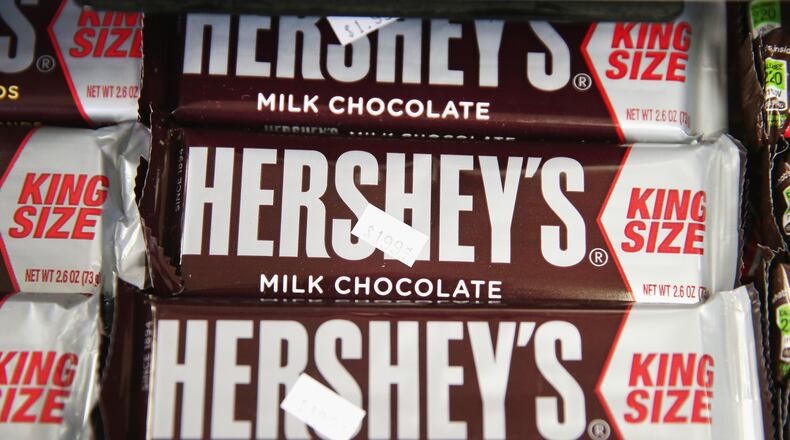Bob Williams of Long Grove, Iowa, has been passing out Hershey's chocolate bars for years to grateful residents.