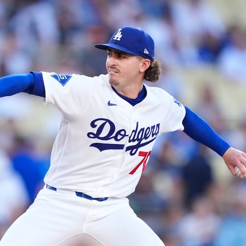 Los Angeles Dodgers starting pitcher Justin Wrobleski throws to the plate during the first inning of a baseball game against the Colorado Rockies, Tuesday, July 7, 2026, in Los Angeles. (AP Photo/Mark J. Terrill)