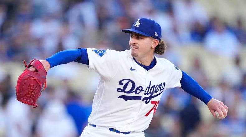 Los Angeles Dodgers starting pitcher Justin Wrobleski throws to the plate during the first inning of a baseball game against the Colorado Rockies, Tuesday, July 7, 2026, in Los Angeles. (AP Photo/Mark J. Terrill)