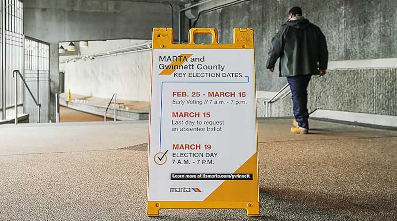 A sign indicating the MARTA and Gwinnett County transit referendum voting calendar is displayed at the Doraville MARTA Transit Station in Doraville.