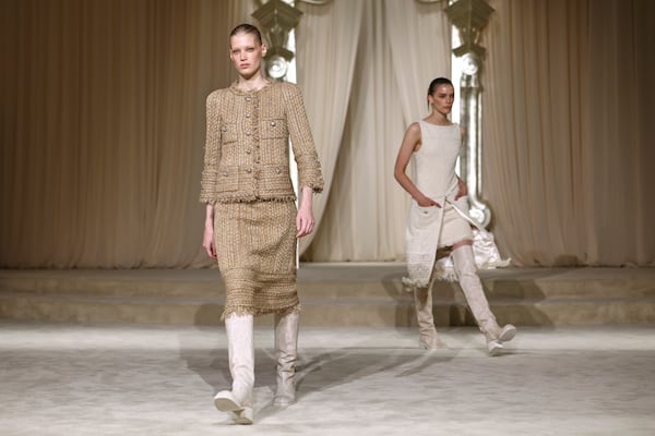 Models wear creations as part of the Chanel Fall-Winter 2025/26 Haute Couture collection presented Tuesday, July 8, 2025, in Paris. (AP Photo/Tom Nicholson)