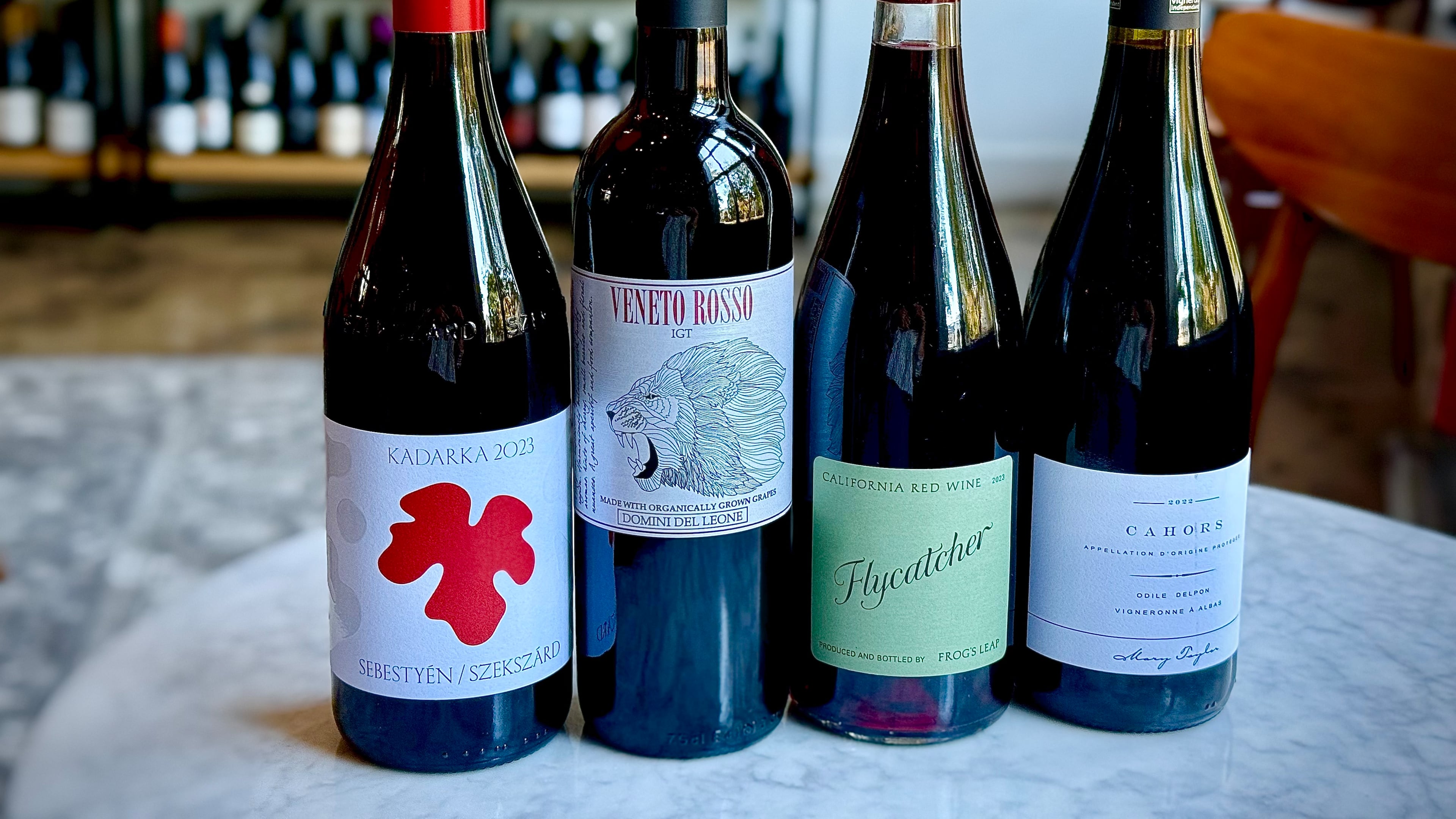 From left: Sebestyén Kadarka from Hungary, Domini del Leone Rosso IGT from Italy, Frog's Leap Flycatcher Red from Napa and Mary Taylor Odile Delpon Cahors from France. (Courtesy of Krista Slater)