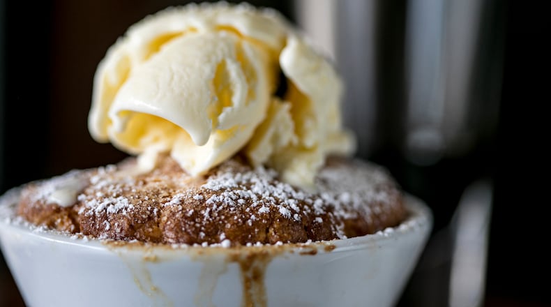 Il Giallo Osteria & Bar offers a Southern peach cobbler served warm with vanilla gelato.