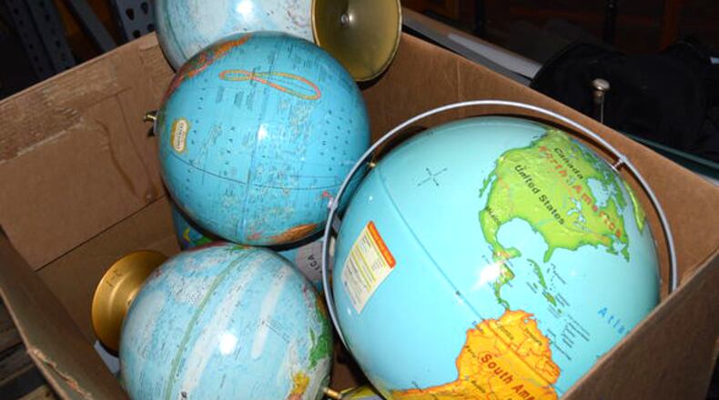 A bin of classroom globes are among the items the Cherokee County Schools plan to sell at auction Nov. 5. JEFF DOBSON & ASSOCIATES