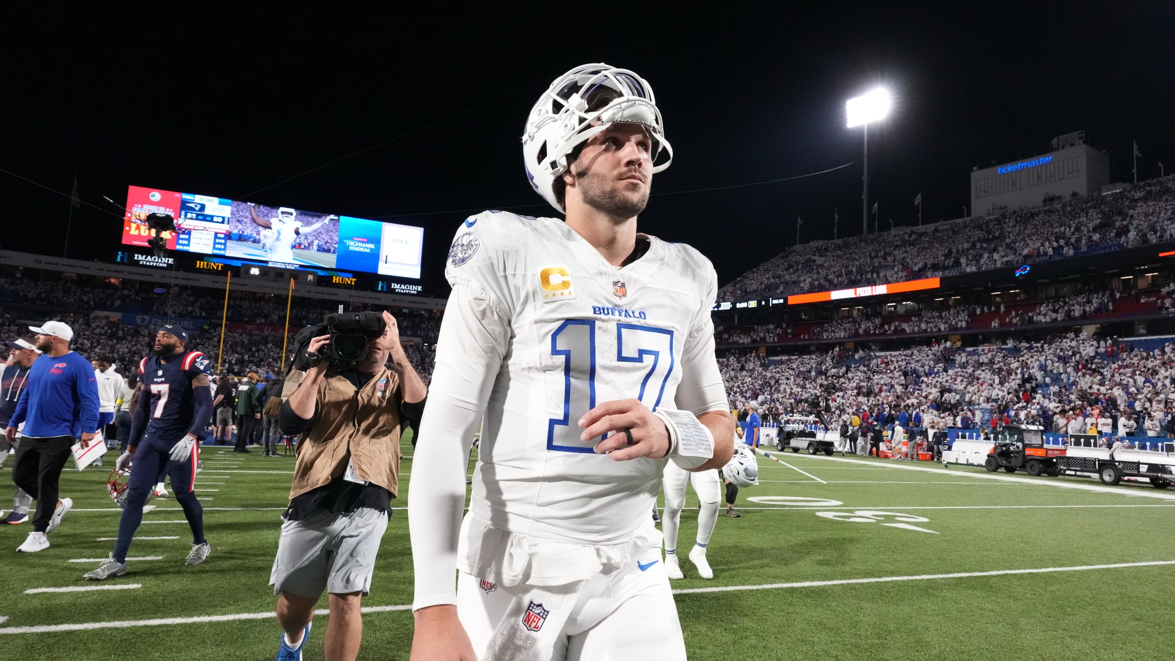 Buffalo Bills quarterback Josh Allen (17) walks off the field after the team's loss to the New England Patriots in an NFL football game, Sunday, Sept. 5, 2025, in Orchard Park, N.Y. (AP Photo/Gene J. Puskar)
