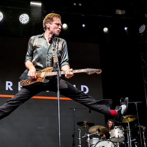 Franz Ferdinand frontman Alex Kapranos jumped around in 90 degree heat, and the Scottish band played a sizzling set of hits and other cuts from its deep catalog at the Shaky Knees Music Festival in Piedmont Park in September 2025. (Ryan Fleisher for the AJC)