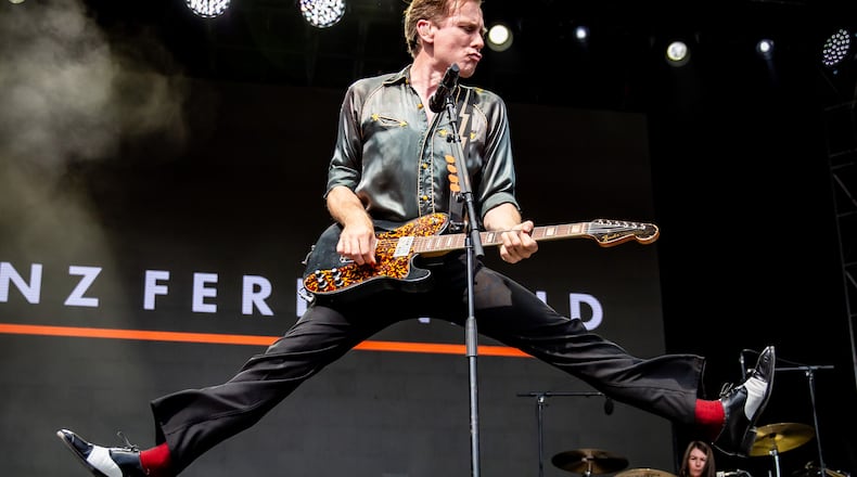 Franz Ferdinand frontman Alex Kapranos jumped around in 90 degree heat, and the Scottish band played a sizzling set of hits and other cuts from its deep catalog at the Shaky Knees Music Festival in Piedmont Park in September 2025. (Ryan Fleisher for the AJC)