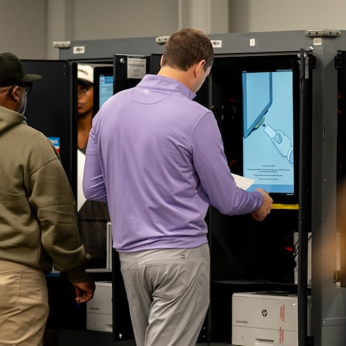 Voters cast their ballots inside the Buckhead Library voting precinct in Atlanta on Monday, Nov. 4, 2025. (Ben Hendren for the AJC)