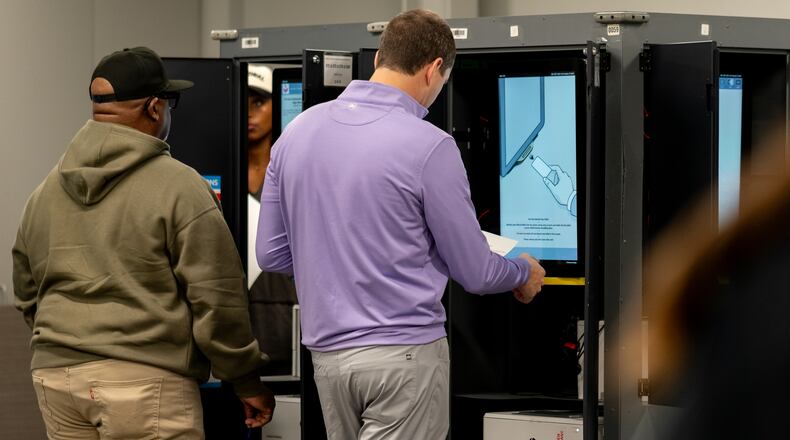 Voters cast their ballots inside the Buckhead Library voting precinct in Atlanta on Monday, Nov. 4, 2025. (Ben Hendren for the AJC)