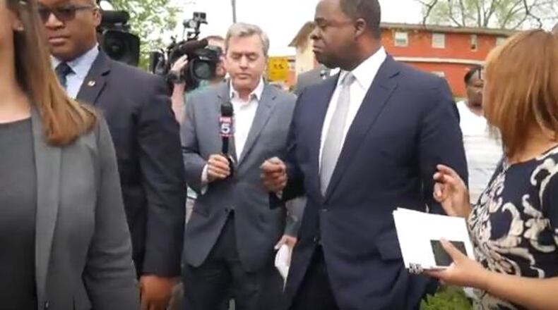 Fox5's Dale Russell (center) and Atlanta Mayor Kasim Reed (right). City of Atlanta footage