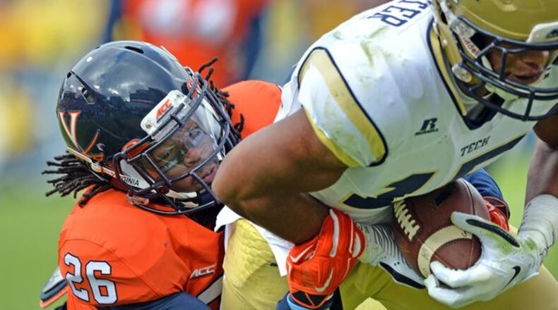 Georgia Tech wide receiver DeAndre Smelter's 18-yard touchdown catch in the first quarter of the Yellow Jackets' 35-10 win over Virginia was a play specially designed for the Cavaliers. (HYOSUB SHIN/AJC)