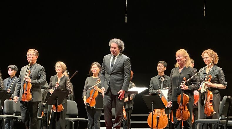 Gustavo Dudamel appears with the New York Philharmonic at a Sounds of Remembrance concert to commemorate the 25th anniversary of the 9/11 attacks at the Perelman Performing Arts Center in New York on Sept. 11, 2026. (AP Photo/Ron Blum)