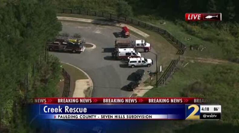 Two of the teens had to be rescued from Pumpkinvine Creek with a rope. Another made it out on their own.