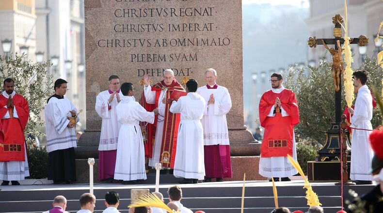 VATICAN CITY, VATICAN - MARCH 25: Pope Francis leads the Palm Sunday Mass at St. Peter's Square on March 25, 2018 in Vatican City, Vatican. Pope Francis on Sunday presided at the Procession and Mass for Palm Sunday, as the Church enters into the celebration of Holy Week. Palm Sunday commemorates the triumphal entry of Jesus into Jerusalem one week before His Passion, Death, and Resurrection. (Photo by Franco Origlia/Getty Images)