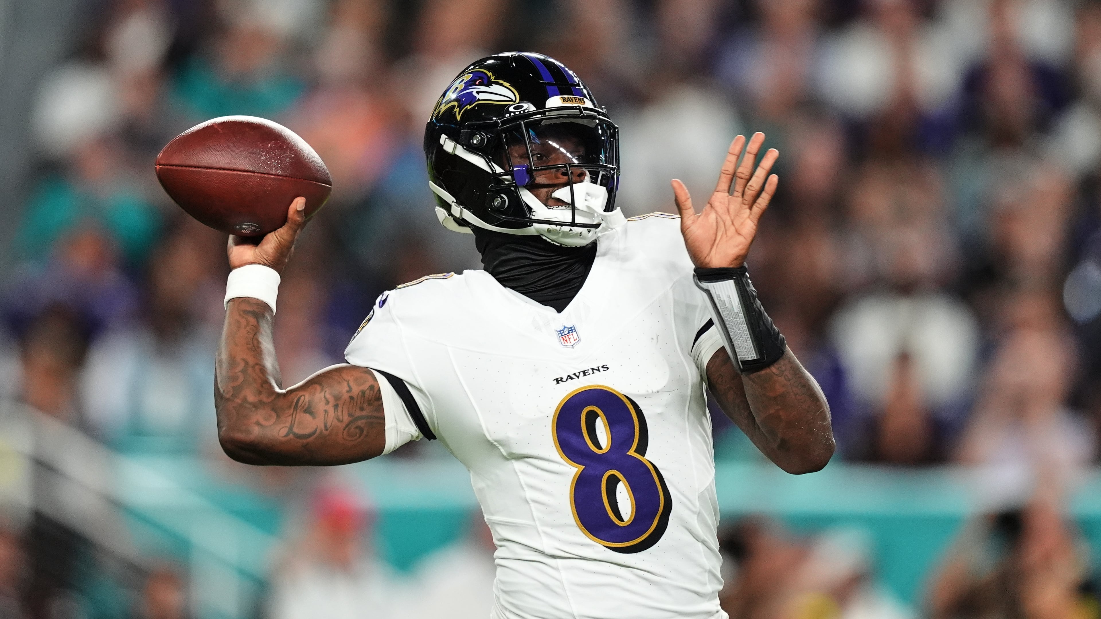 Baltimore Ravens quarterback Lamar Jackson (8) throws against the Miami Dolphins during the first half of an NFL football game, Thursday, Oct. 30, 2025, in Miami Gardens, Fla. (AP Photo/Rebecca Blackwell)