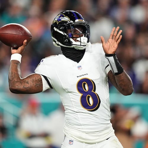 Baltimore Ravens quarterback Lamar Jackson (8) throws against the Miami Dolphins during the first half of an NFL football game, Thursday, Oct. 30, 2025, in Miami Gardens, Fla. (AP Photo/Rebecca Blackwell)