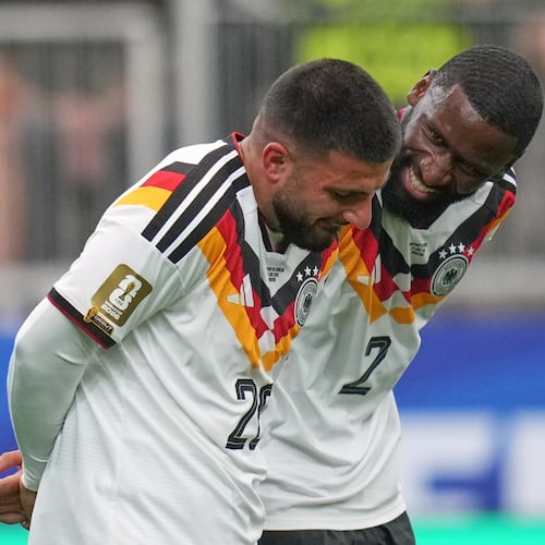 Germany's Deniz Undav, left, and Antonio Ruediger reacts after scoring the sixth goal during the World Cup Group E soccer match between Germany and Curacao in Houston, Sunday, June 14, 2026. (AP Photo/Eric Gay)