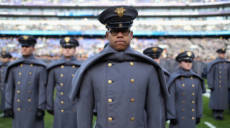 Army cadets stand on the field before the start of the Army-Navy football game December in Baltimore. (Rob Carr/Getty Images)